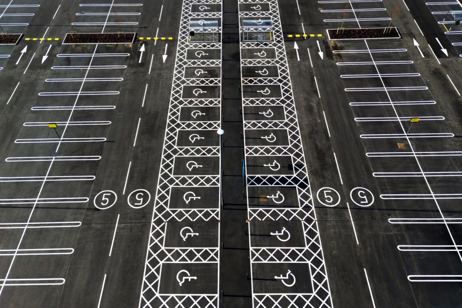 Aerial view of a row of marked disabled parking bays